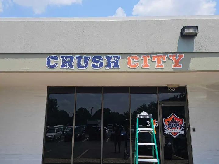 Crush City letters mounted above a storefront