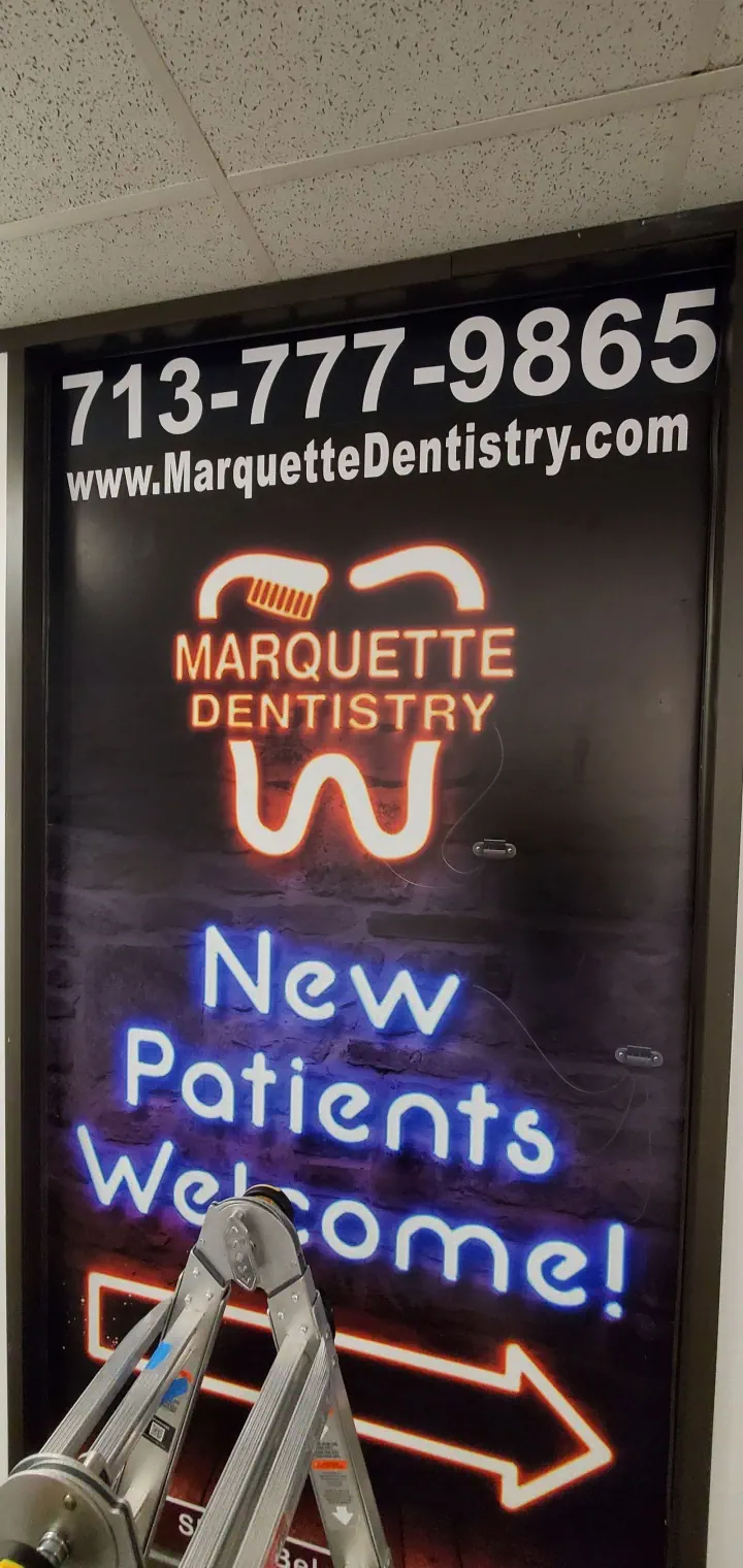 Marquette Dentistry illuminated window graphic