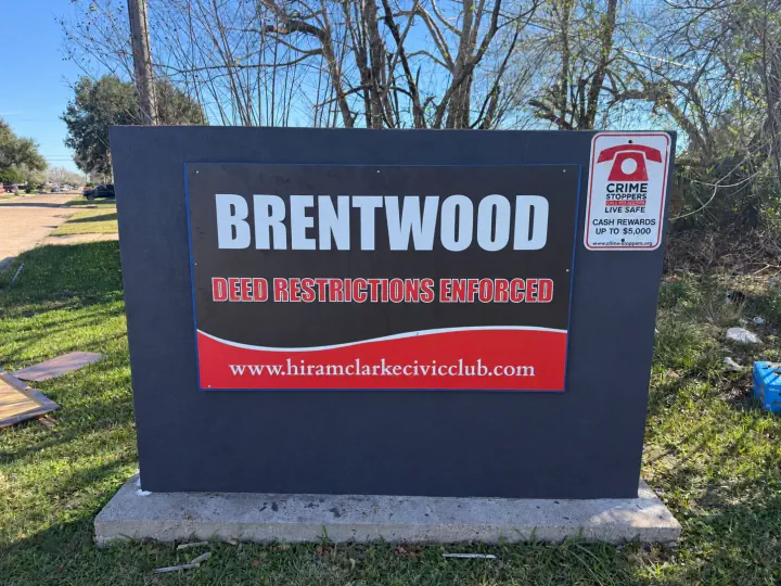 Brentwood freestanding sign with red and white lettering