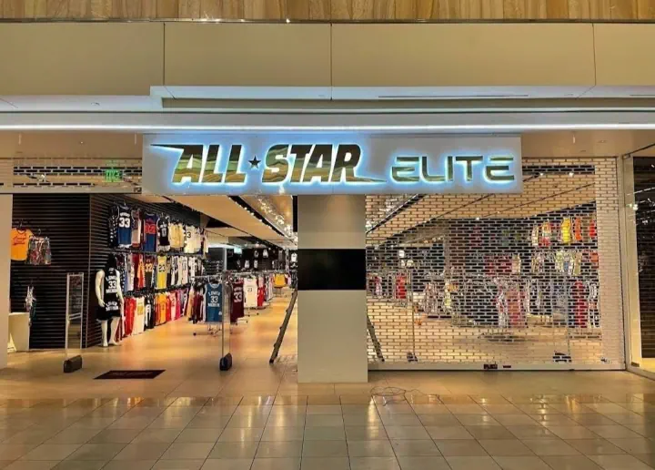 ALL-STAR ELITE illuminated storefront sign in a shopping mall