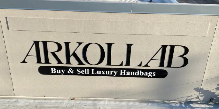 Close-up of ARKOLLAB dimensional letters on a building facade