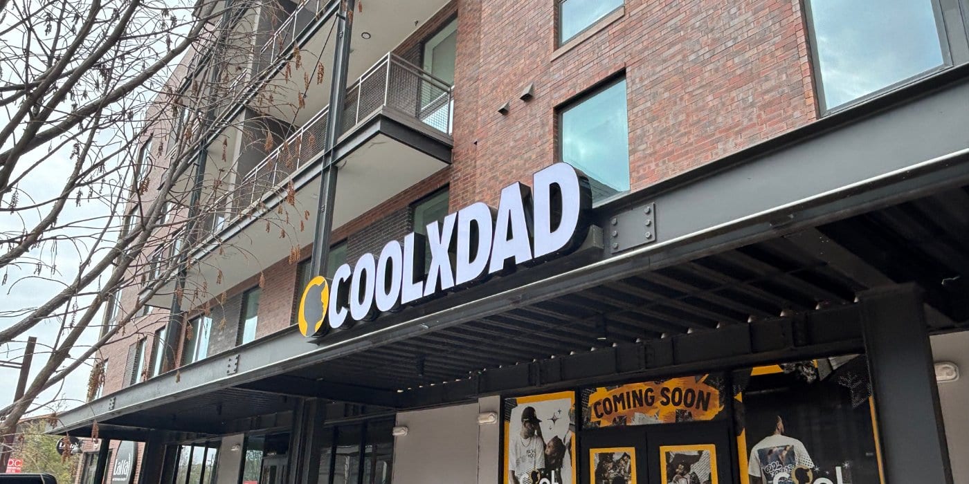Illuminated channel letters mounted on a storefront awning