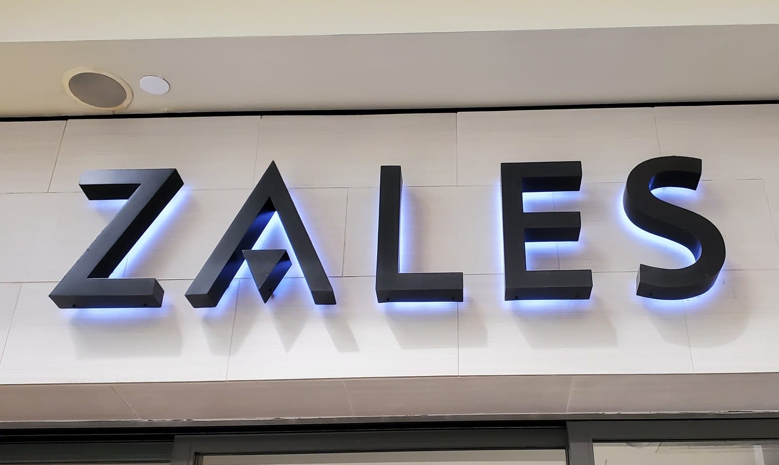 Zales backlit storefront letters in a shopping mall
