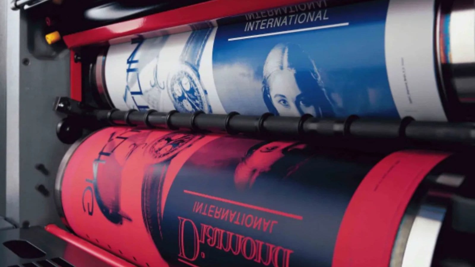 Offset press running a four-colour job