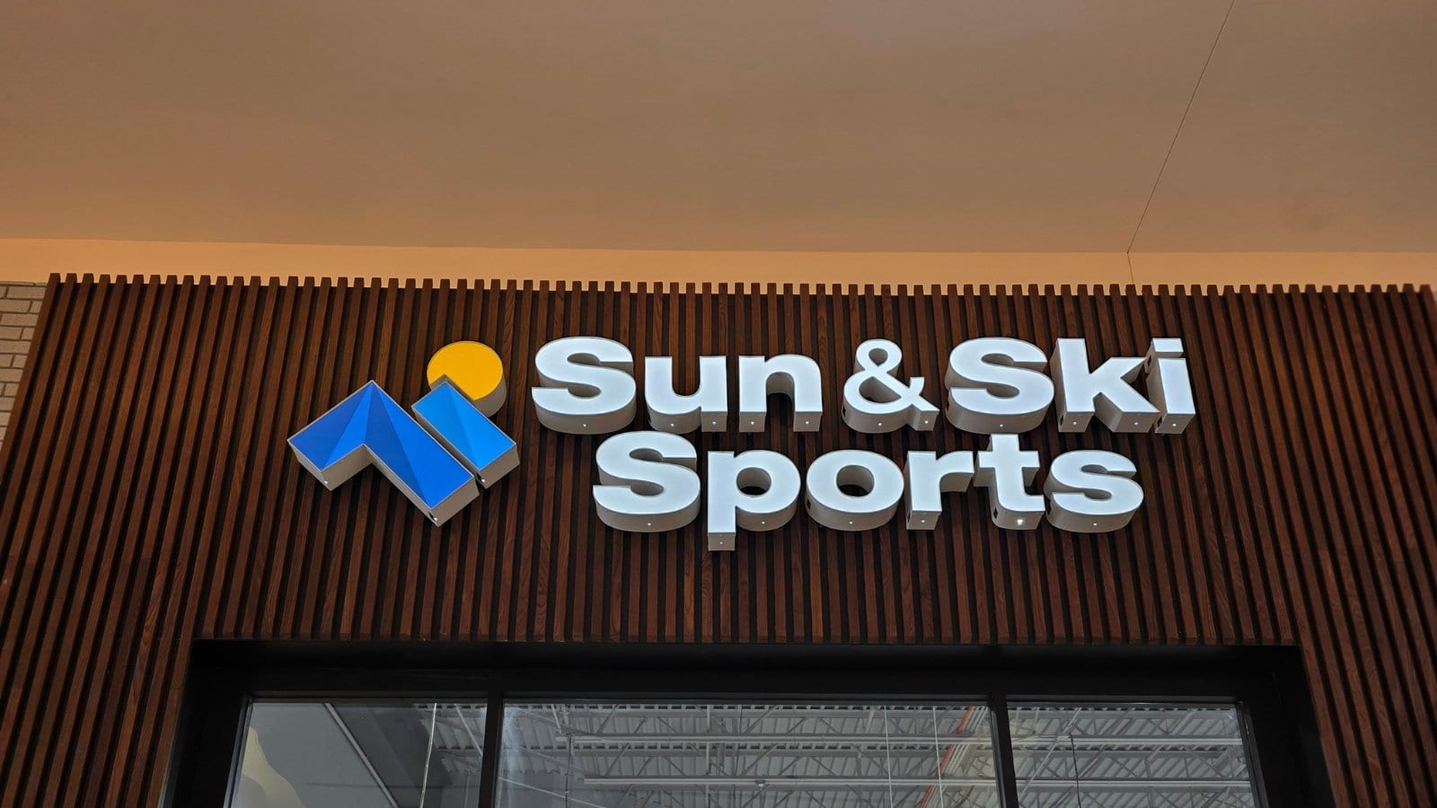 Illuminated channel letters on a retail storefront